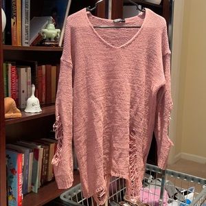 Ripped sweater